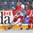 ST. CATHARINES, CANADA - JANUARY 11: Czech Republic's Noemi Neubauerova #25 and Russia's Sofia Senchukova #27 battle for the puck near the boards during preliminary round action at the 2016 IIHF Ice Hockey U18 Women's World Championship. (Photo by Francois Laplante/HHOF-IIHF Images)


